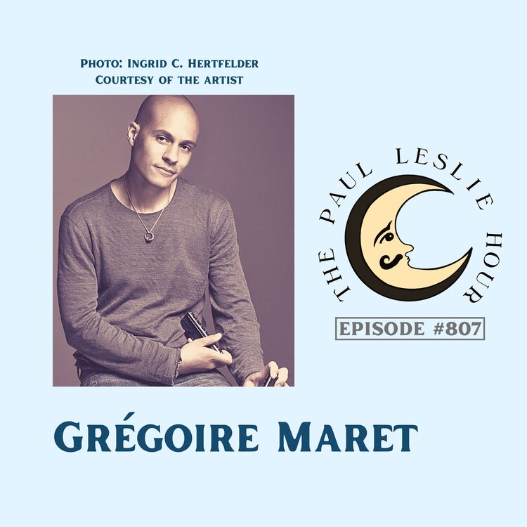 Photo of Grégoire Maret on pale blue background.