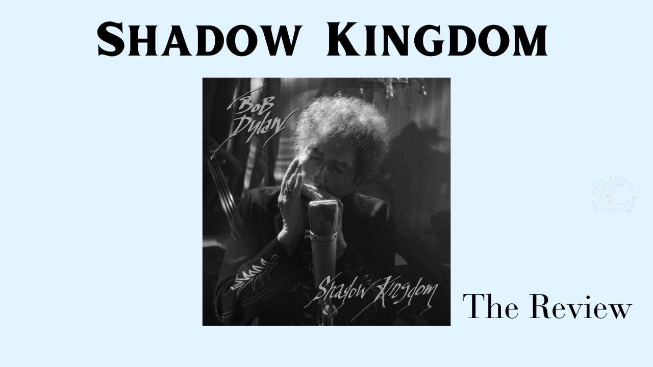 Bob Dylan's Shadow Kingdom album is shown on a light blue background with text that says "The Review" and "Shadow Kingdom."